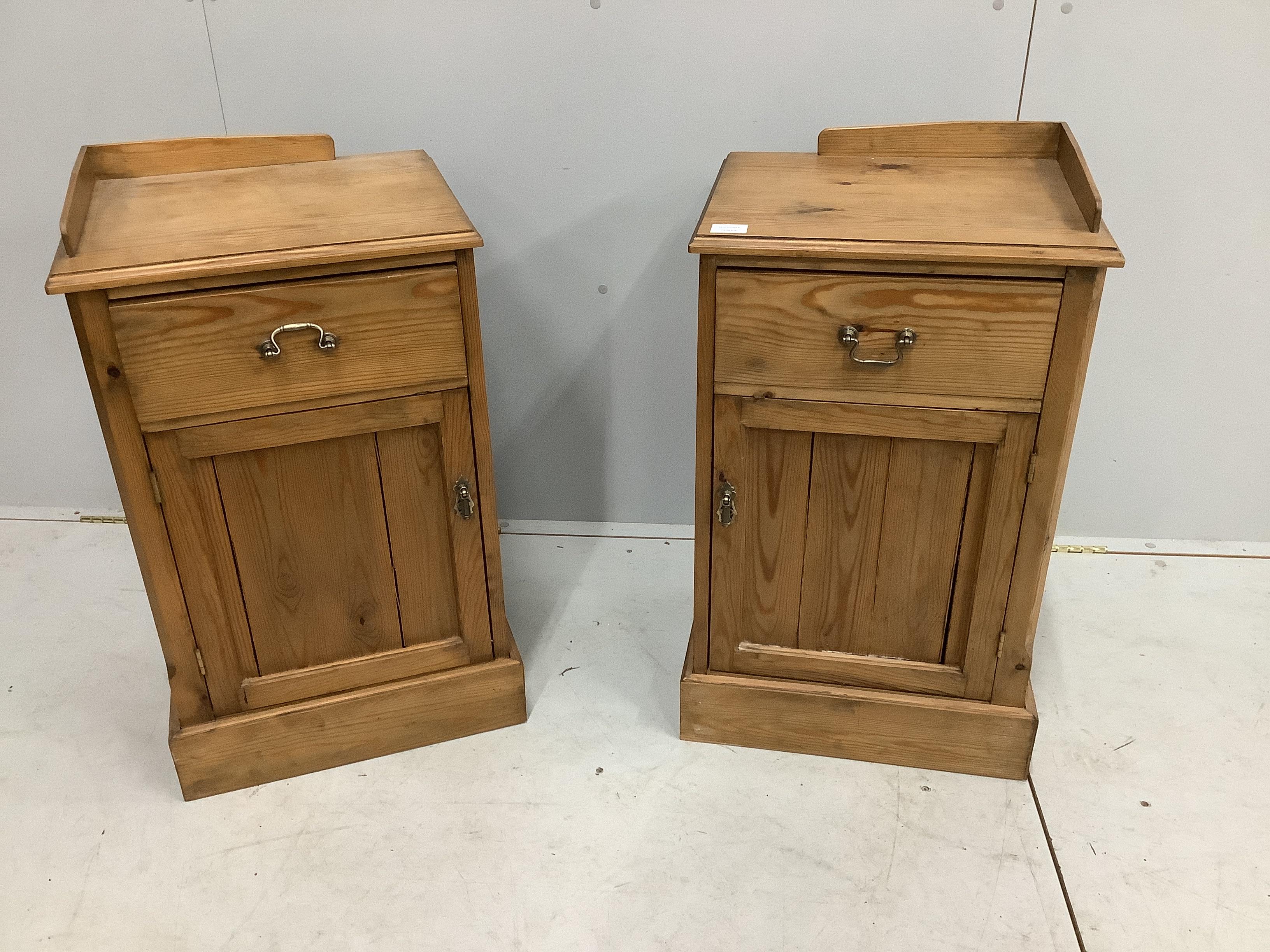 A pair of pitch pine bedside cabinets, width 45cm, depth 37cm, height 78cm